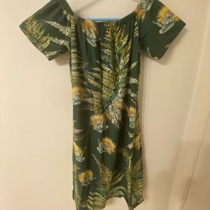Kahulaleʻa green dress with lehua print.